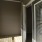 a balcony with a door open